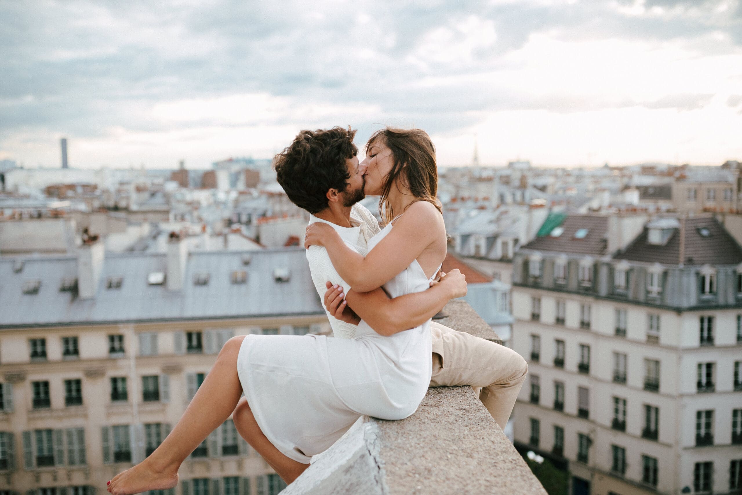 Romantic Paris Rooftop Engagement at Sunset